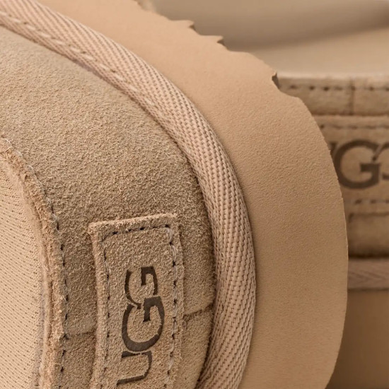 UGG GOLDENSTAR HI CUTOUT SLIDE SANDAL 1175132 SAND